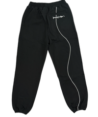 Black sweatpants with a white logo on a white background